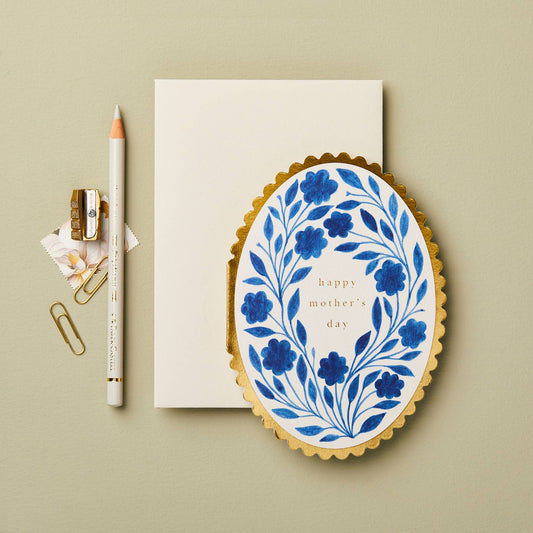 Delft Flora Mother's Day cards shown stacked, styled with ribbon