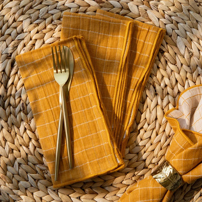 Ochre Double Weave napkins shown unfolded to display the full weave – PABOOM