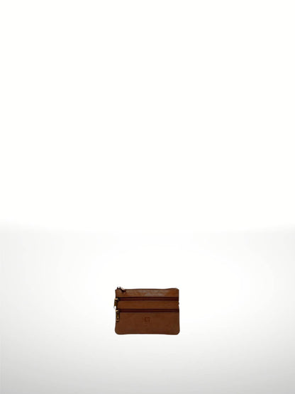 Titan Leather Wallet in Leather — compact three-zip leather pouch with embossed logo tab, shown flat on white background