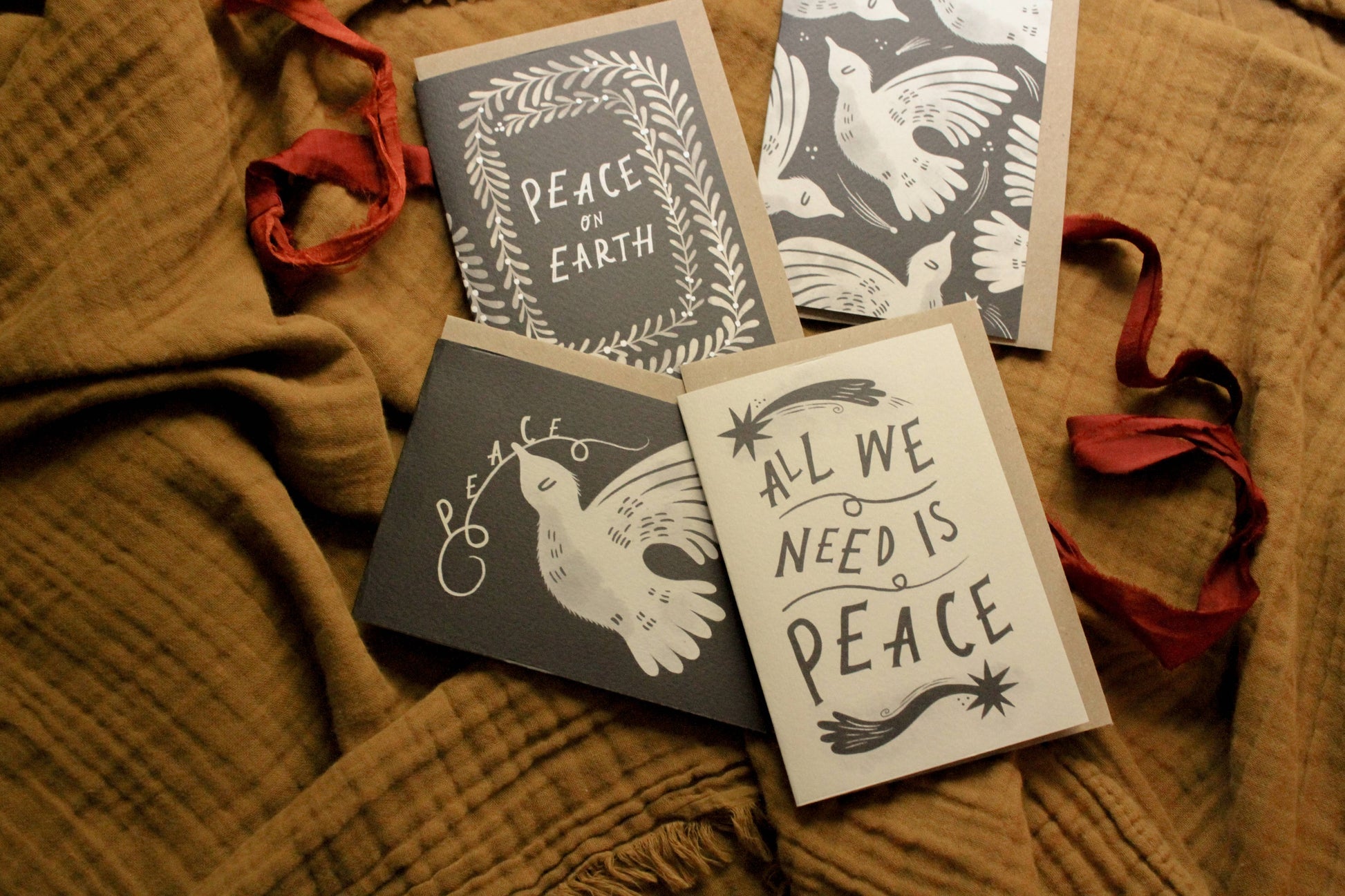 Close-up of the watercolour dove illustration on 'A Dove for Peace' Christmas card