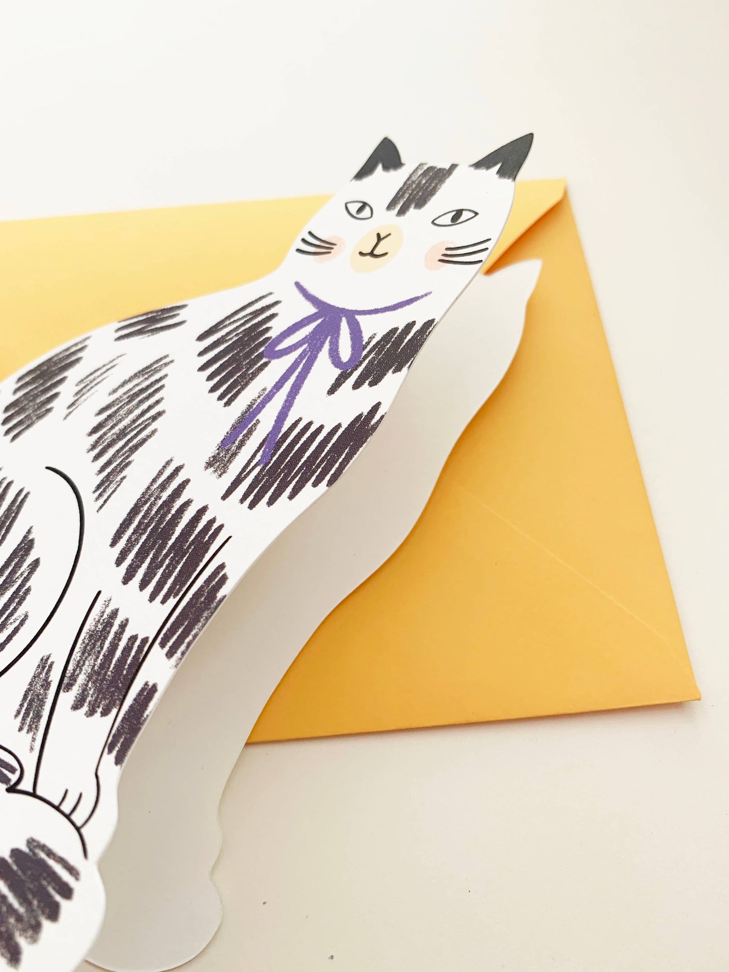 Sitting Kitty Shaped Greeting Card - Black White shown from a side angle