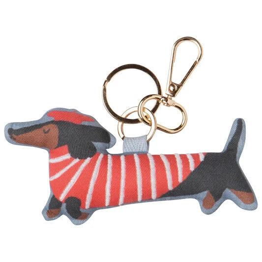 Plush fabric dachshund bag charm wearing a red striped sweater and cap, attached to a gold keyring clasp – PABOOM