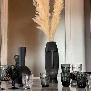 Glass Faces Tumbler Clear