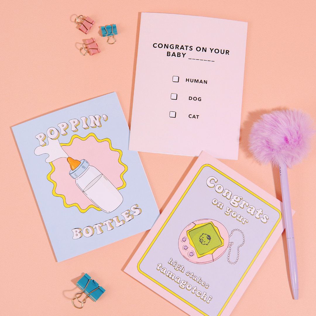High Stakes Baby card paired with its purple envelope