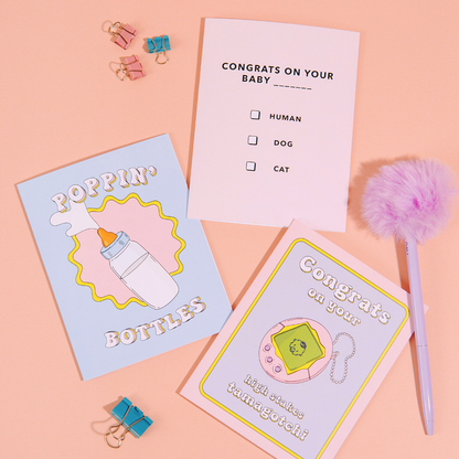 High Stakes Baby card paired with its purple envelope