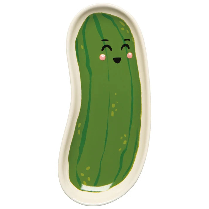 Green stoneware dish shaped like a smiling pickle with pink cheeks on a cream tray base – PABOOM