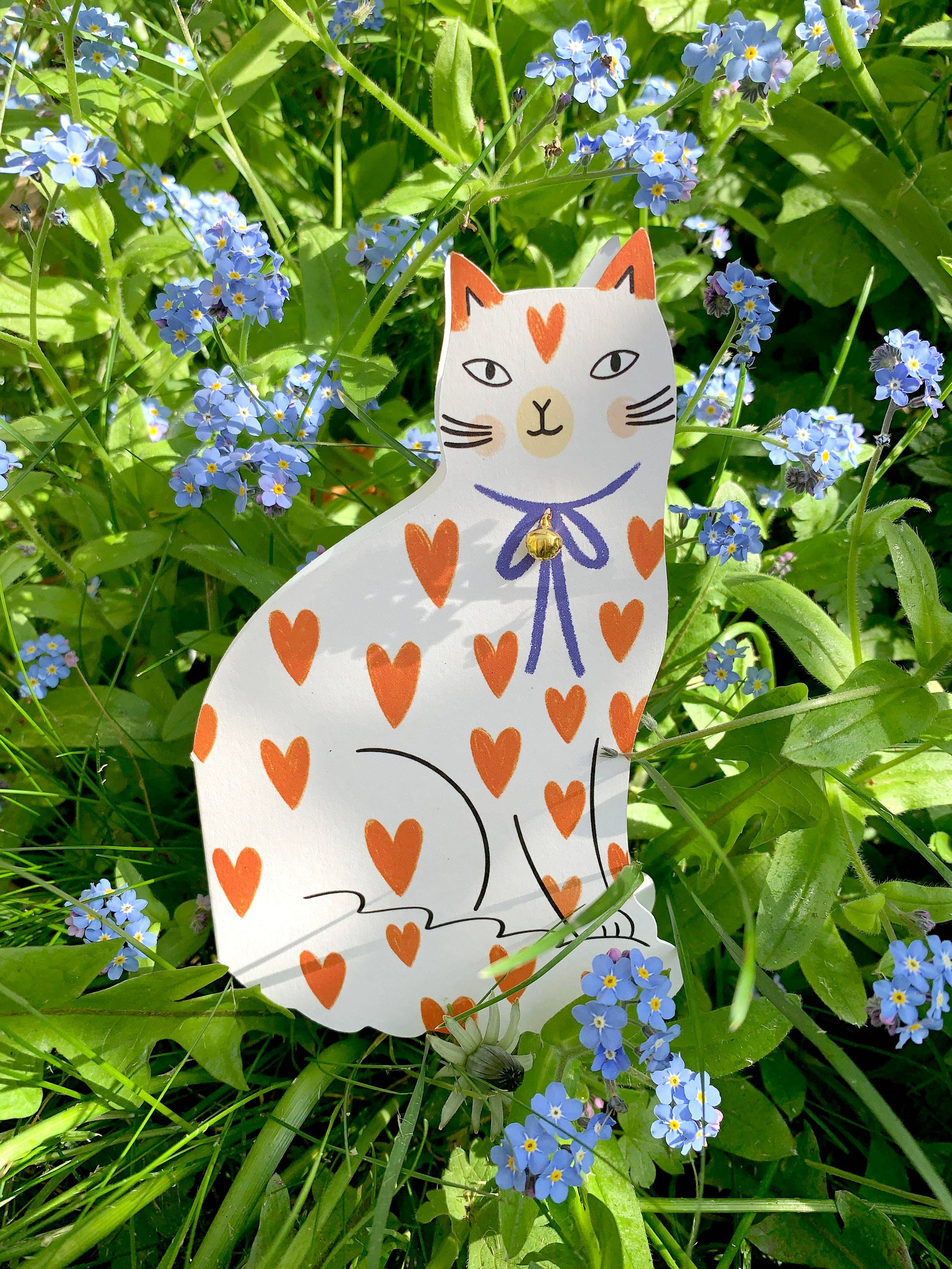 Sitting Kitty Shaped Greeting Card Loveheart displayed in a styled flat lay