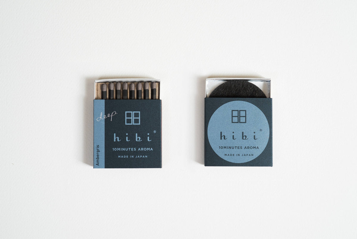 Hibi Ambergris incense matches in a deep blue box, open to show matchsticks beside a closed box - PABOOM