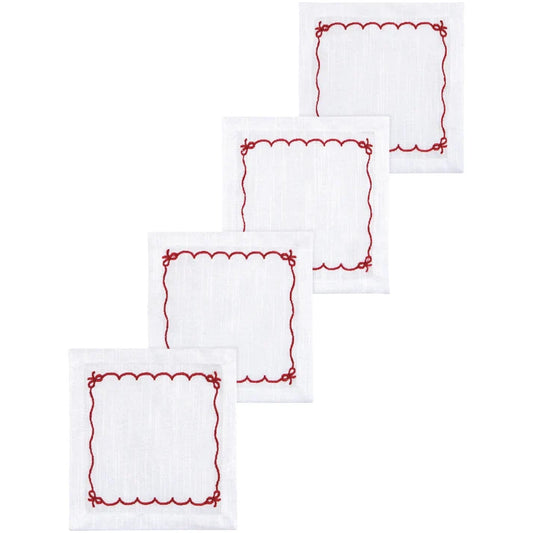 Four white cotton cocktail napkins with a red scalloped and bow-tied embroidered border – PABOOM