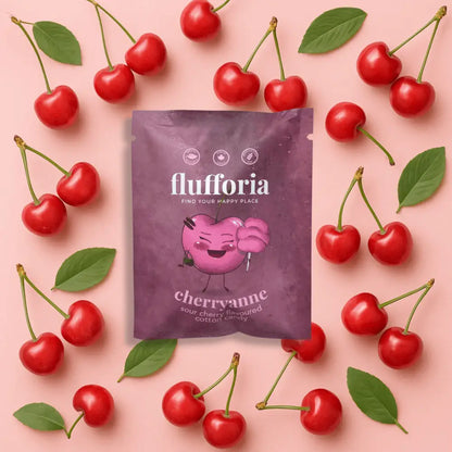 Package of Flufforia’s cotton candy, cherryanne flavour, purple package. pink background with cherries- PABOOM