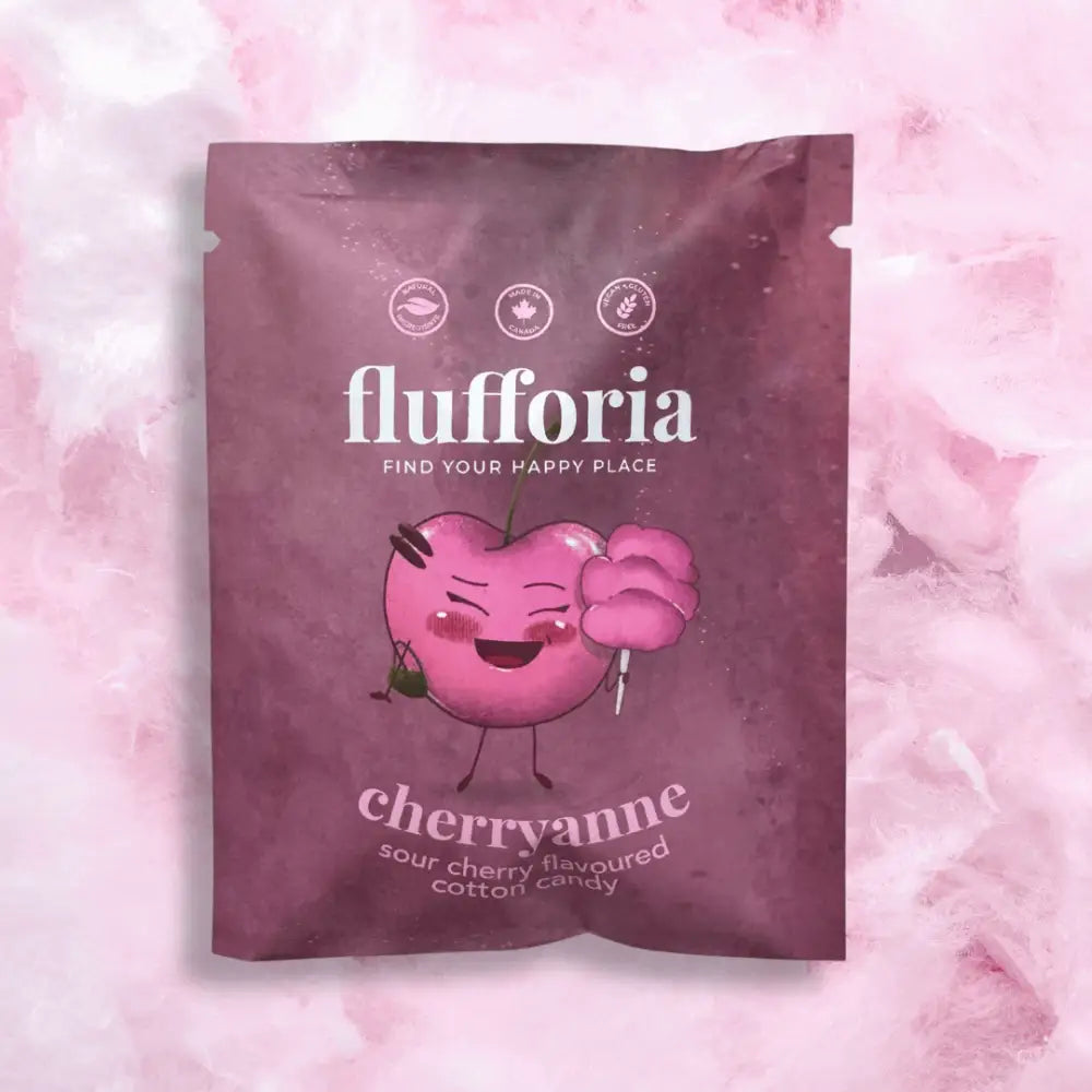 Package of Flufforia’s cotton candy, cherryanne flavour, purple package. Pink cotton candy background - PABOOM