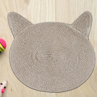 braided cotton cat head shape mat on floor, taupe