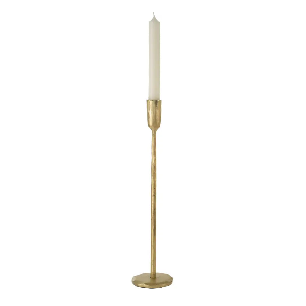 Tall gold forged iron candlestick with a cream taper candle on a round base - PABOOM
