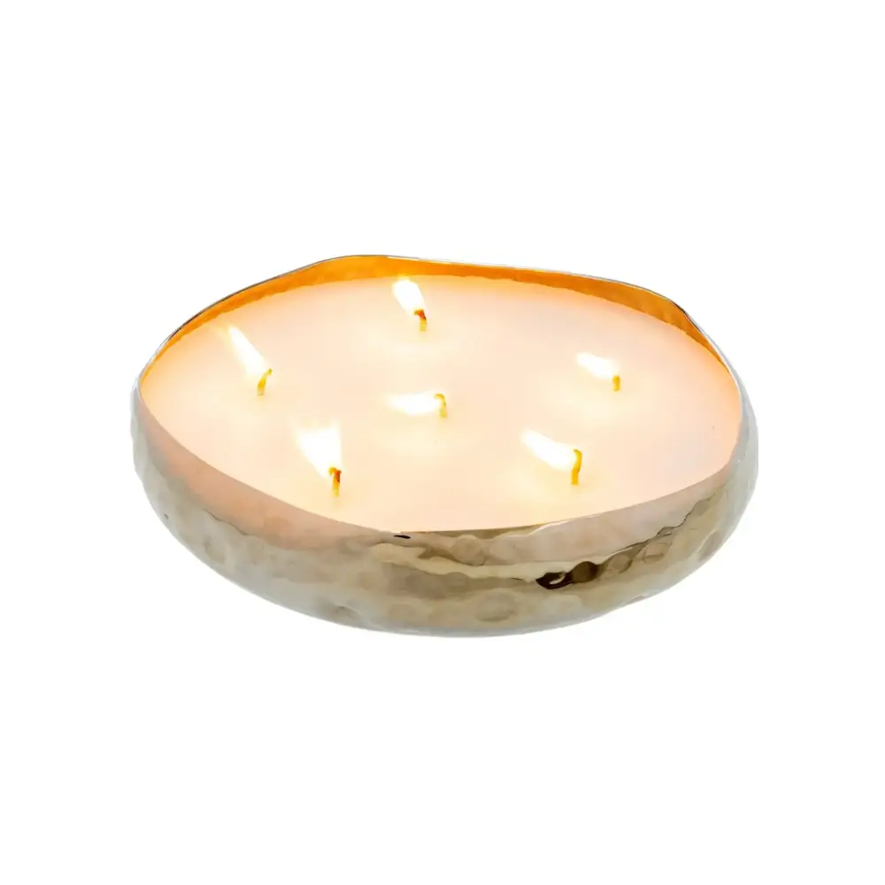 Large multi-wick candle with six lit flames in a hammered silver bowl-shaped vessel - PABOOM