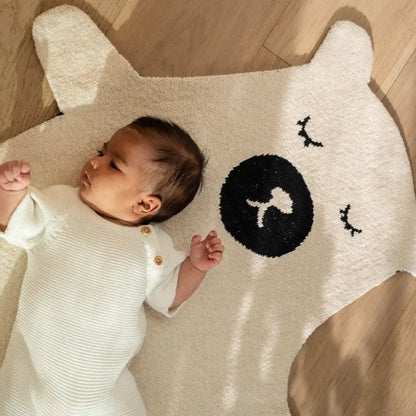 Sleeping bear rug with baby laying on top - PABOOM