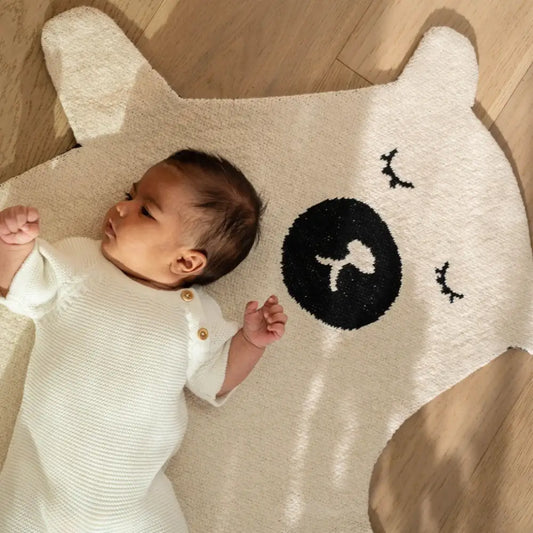 Sleeping bear rug with baby laying on top - PABOOM