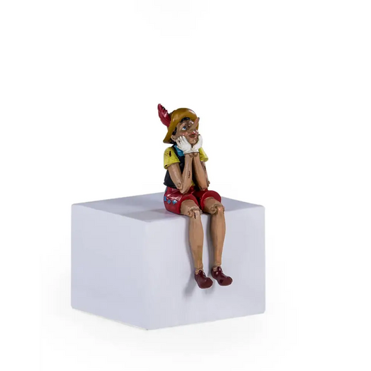 McGowan & Rutherford Ltd - Antiqued Sitting Pinocchio Figure