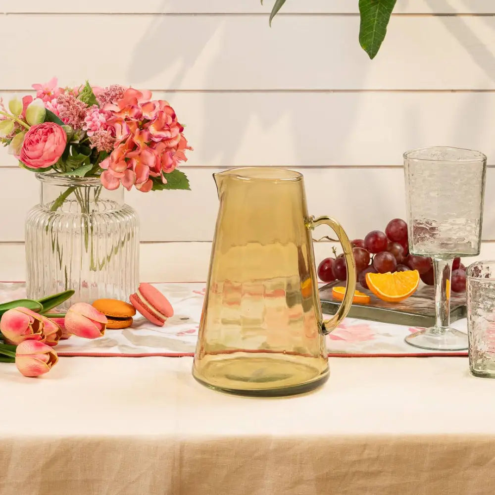 Recycled glass pitcher jug, olive green. on a table with other glassware- PABOOM