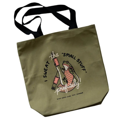 Large green tote bag with a frog doing aerobics and text “I Sweat the small stuff profusely” by Stay Home Club, green with black handles - PABOOM