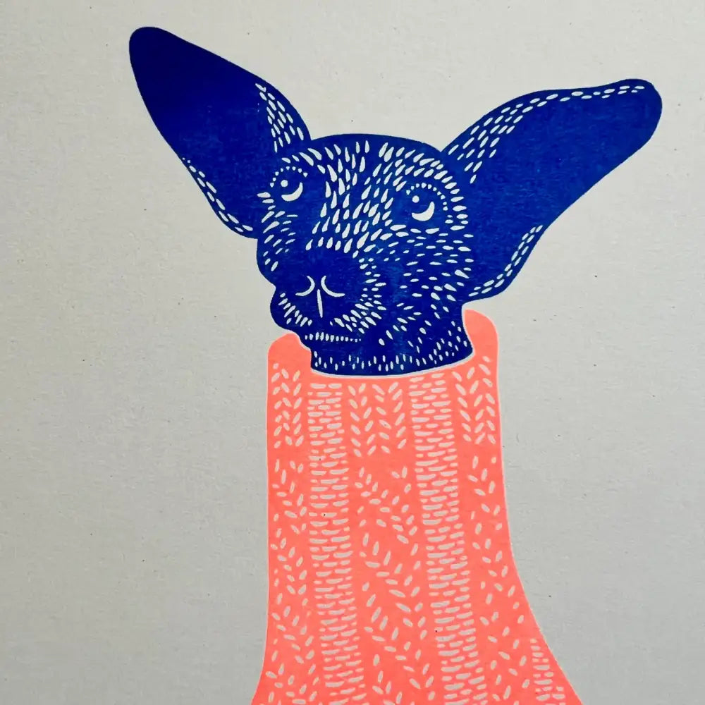Strangford - Knit Picker Print - blue dog ears peach-colored sweater