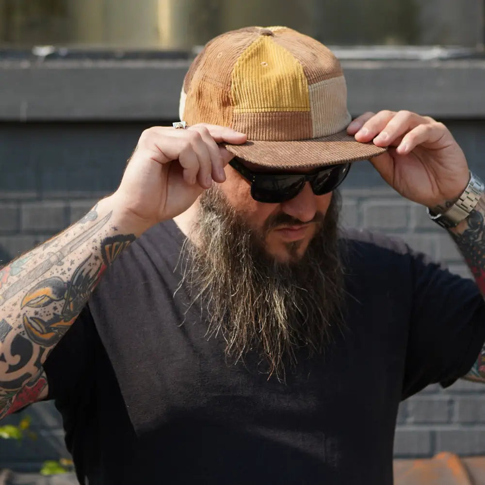 Patchwork corduroy Stuntin Goods cap worn on person’s head - PABOOM