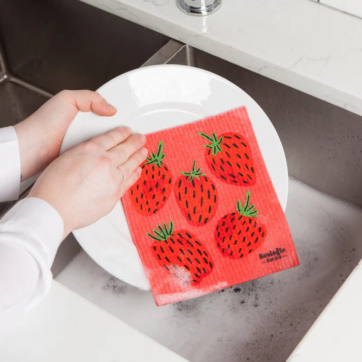 Berry Sweet dishcloth shown folded to display the strawberry print – PABOOM