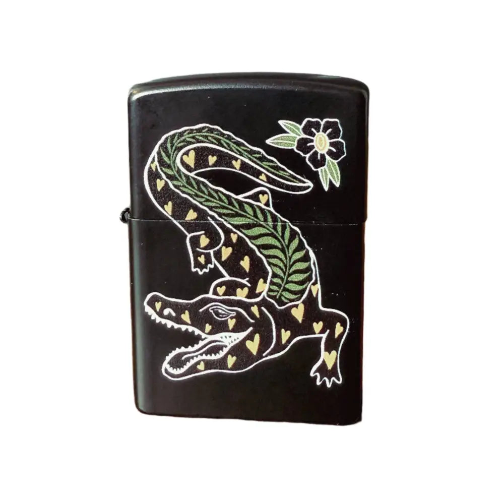 Zippo black lighter with a decorative heart and fern pattered alligator