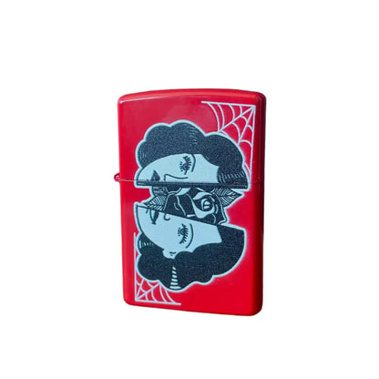 Zippo red lighter with a woman’s face splint in half with rose in middle