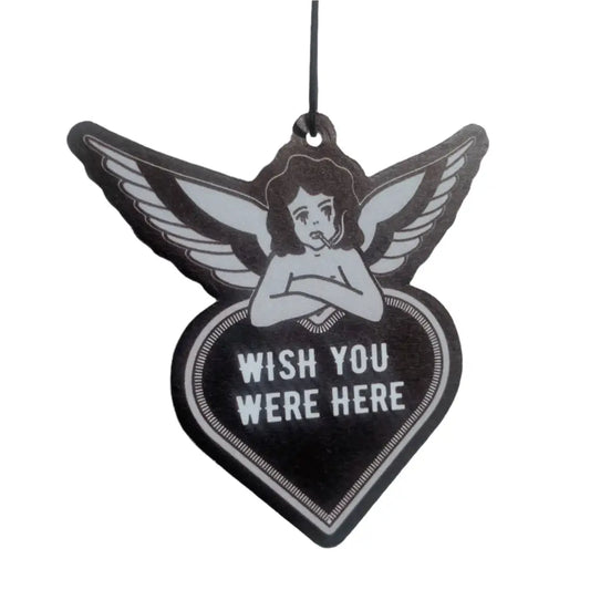 Air freshener on string of an angel smoking with bleeding eyes leaning on a heart saying Wish You Were Here
