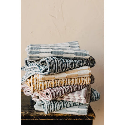 Canyon Rose dishtowels styled on a kitchen counter – PABOOM