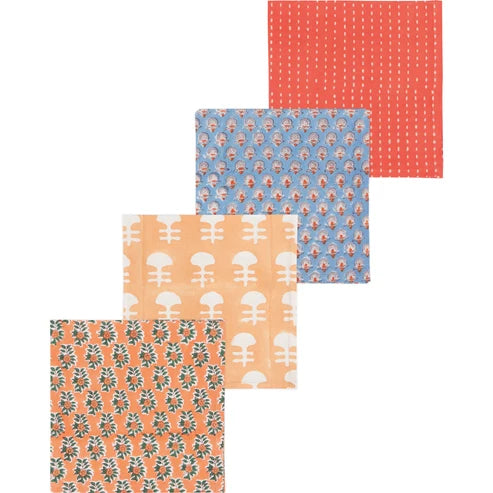 Four mismatched hand block-printed cotton napkins in terracotta stripe, blue floral, peach tree, and orange floral patterns - PABOOM
