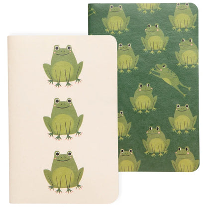 Two pocket notebooks, one cream with three cartoon frogs and one dark green with an all-over frog pattern – PABOOM